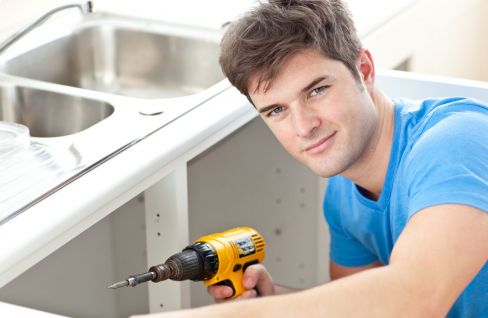 Worker from our building company working on kitchen renovation in Brooklyn, Wellington City